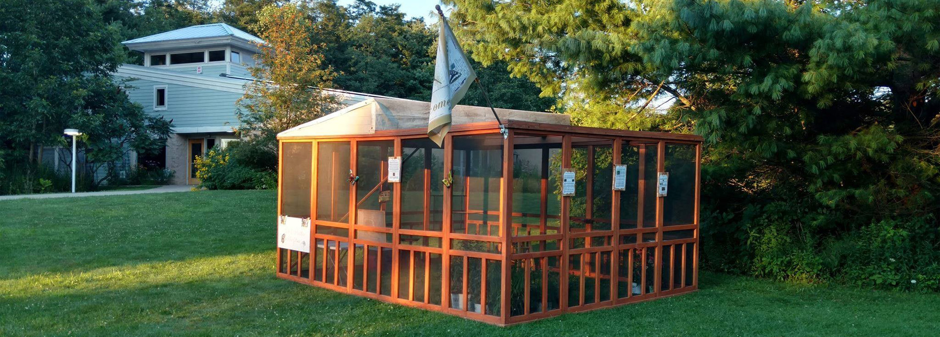 Slideshow Image - A butterfly enclosure at GNC for the Pollinator Festival