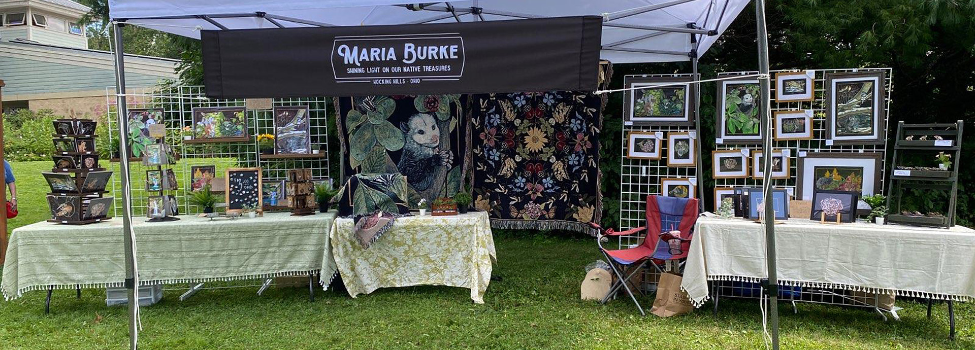 Slideshow Image - A nature art booth set up at GNC for the Pollinator Festival