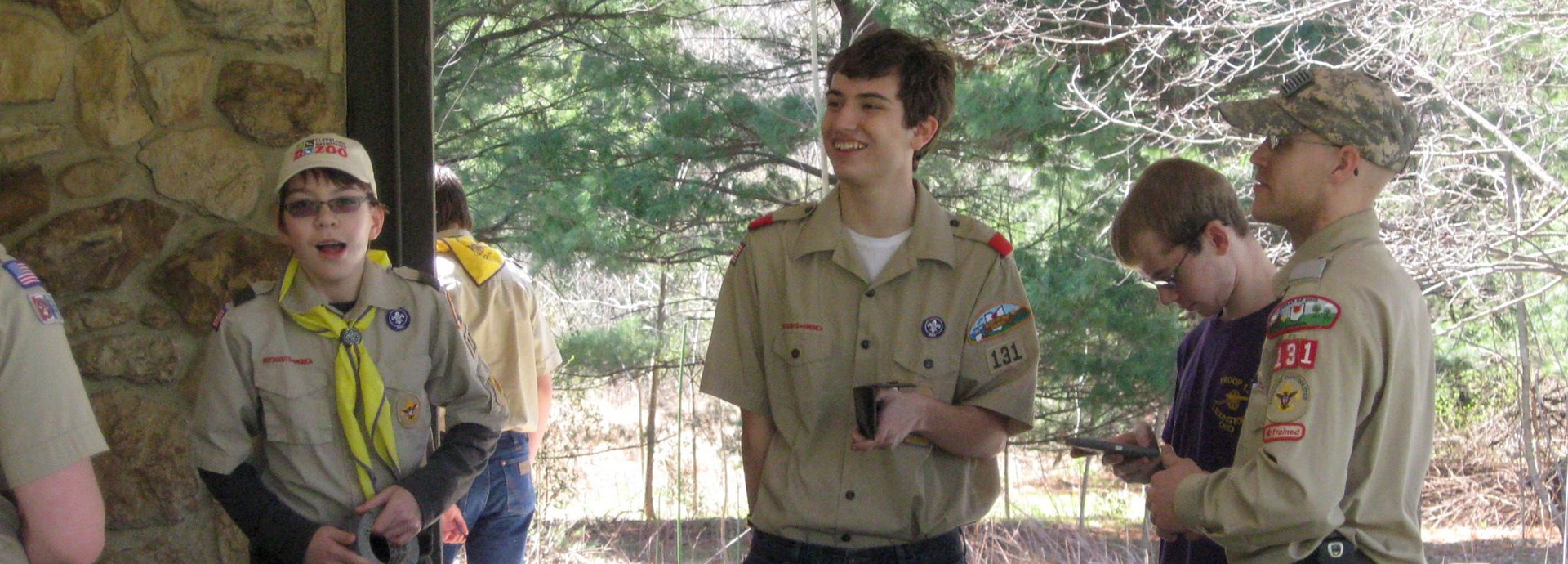 Slideshow Image - A boy scouts troop in GNC's picnic pavilion during Mohican Wildlife Weekend