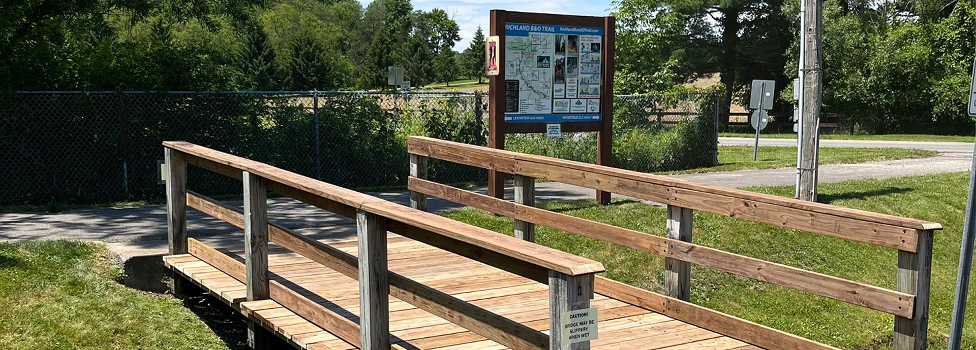 Slideshow Image - A newly built bridge leading to the B&O trail